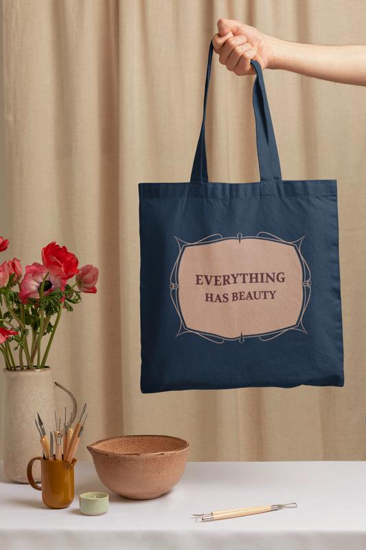 Everything has beauty Printed navy blue Tote Bag